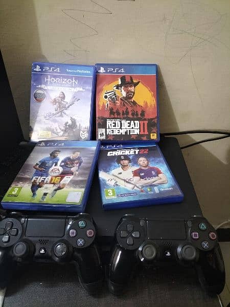 Ps4 slim 1 Tb storage  with 2 original controllers and 4 games 2