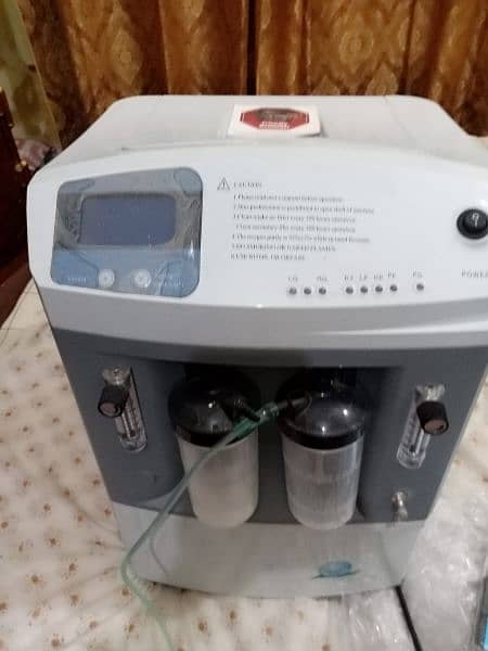 oxygen concentrator dual flow only 01month used 5