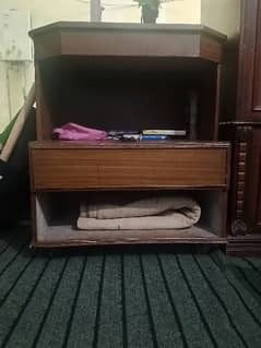 wood tv trolley also has space for books etc