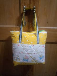 Quilted fabric baby bag