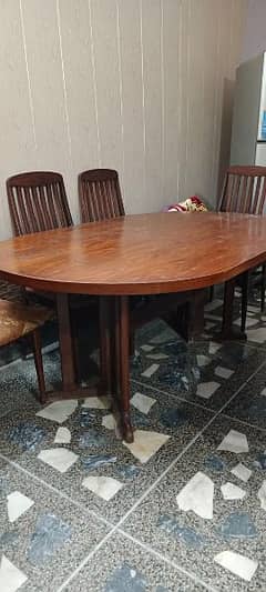 Wooden Dinning table with complete 6 chair