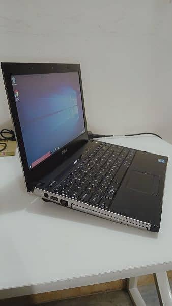 Dell Vostro laptop with orginal charger battery 0