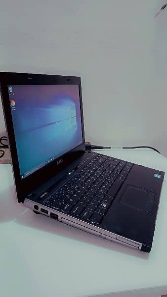 Dell Vostro laptop with orginal charger battery 4