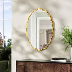 gold oval wavay mirror 0