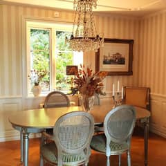 Dining table with cane chairs