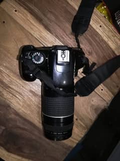 Canon D1100 model big lens