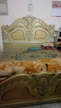 king size bed with side tables with 2 chairs dressing  showcase