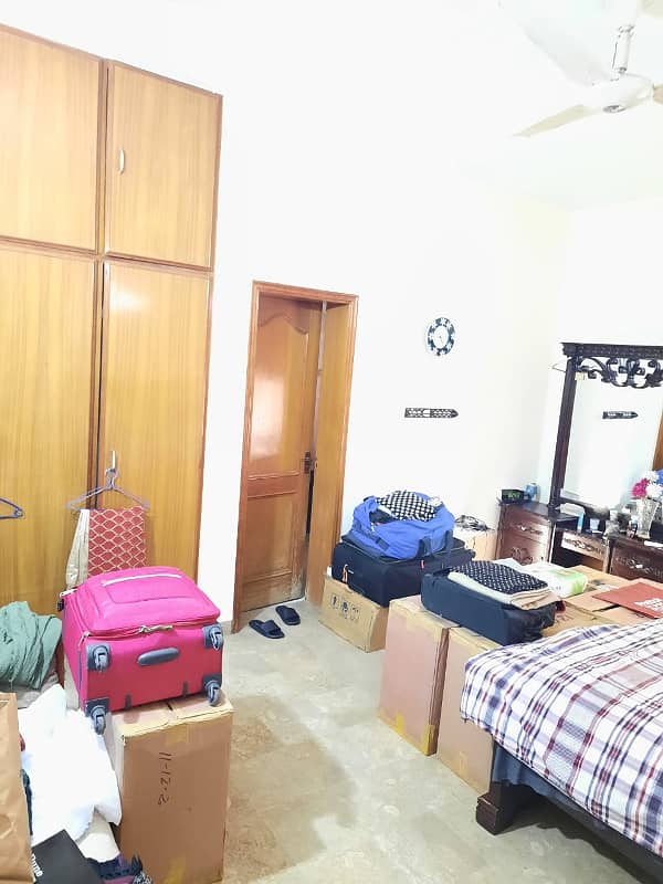 1 kanal Owner build house proper double unit 3 bedrooms 2 tv lounge 2 drawing room, dining room 2 kitchen hand made Diyar wood works ideal location packages mall McDonalds market parks beautiful elevation 4