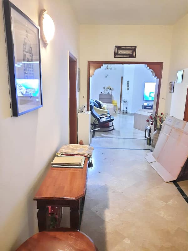 1 kanal Owner build house proper double unit 3 bedrooms 2 tv lounge 2 drawing room, dining room 2 kitchen hand made Diyar wood works ideal location packages mall McDonalds market parks beautiful elevation 17