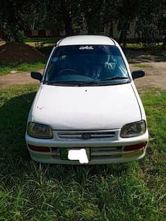 Daihatsu Cuore 2004 color white For Sale