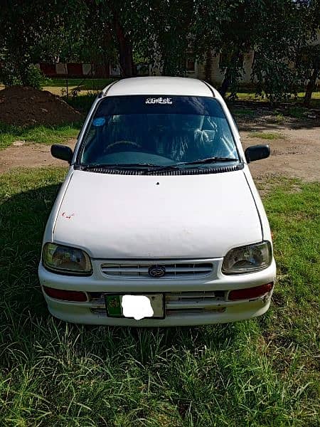 Daihatsu Cuore 2004 color white For Sale 1