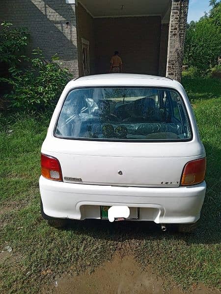 Daihatsu Cuore 2004 color white For Sale 2