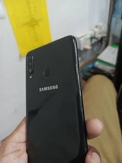 Samsung Galaxy A20s contact \/