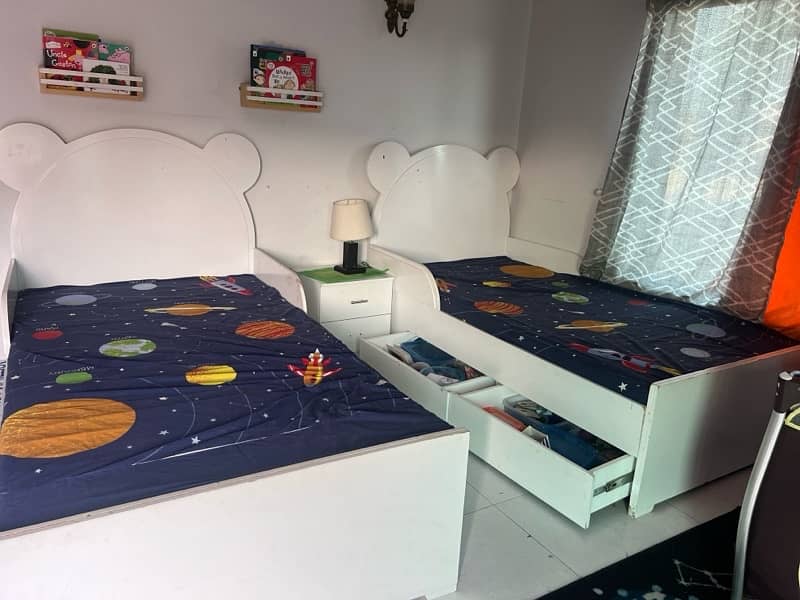 2 bear shaped adult sized beds with 1 mid-table 4