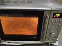 Japanese company onn 25 litter extra large silver microwave oven