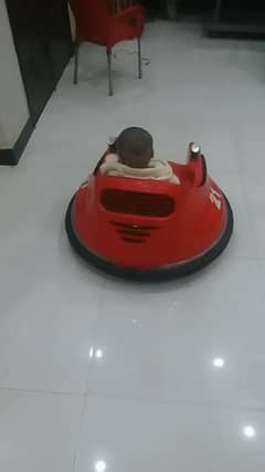 Kids electric car spaceship with gears on top