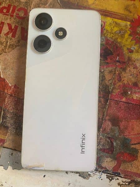 Infinix hot 12 play condition ok daba charger warranty 2 month Baki ha 2