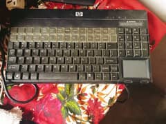 Hp keyboard with touch mouse