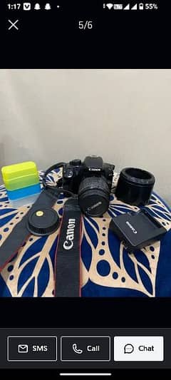 canon 1000d with charger and 16gb card and 18/55 lens