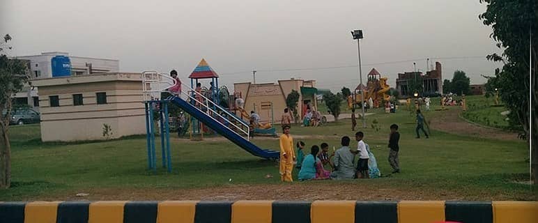 7 Marla Corner Facing Park All Dues Clear Plot For Sale, LDA Approved, Open Form No Transfer Fee Extra Land Paid In Khayaban-E-Amin G Block Lahore 1