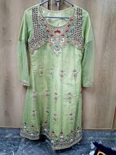 fancy net frock with trouser and dupatta.