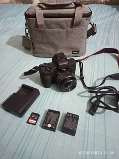 Canon M50 Mark 2, 50mm 1.8 STM, Viltrox converter, microphone and bag