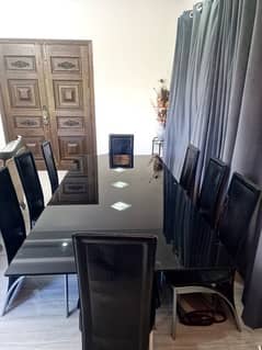 8 seater black glass dining table