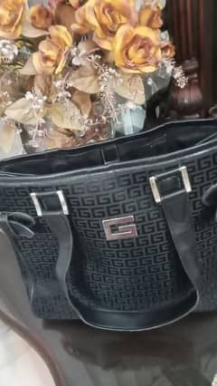 black Gucci handbag