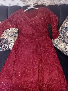 Mehroon colour frock having sitaras on it size is small size.