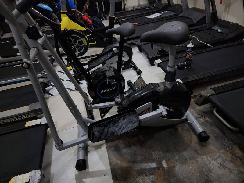 treadmils. (0309 5885468). gym cycles. home gym. ellapticals 12