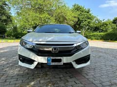 Honda Civic Oriel prosmetic ug full option  Islamabad registered