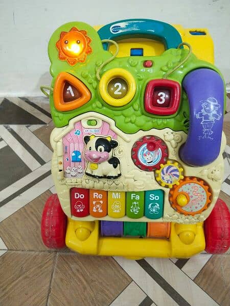 musical toy with piano good condition. . . . 1