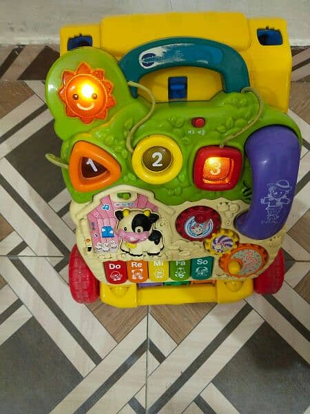 musical toy with piano good condition. . . . 2