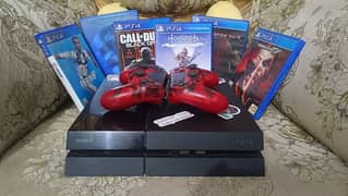 PS4 WITH 6 GAMES AND 2 CONTROLLER