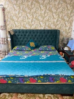 bed for sale with chair and small table