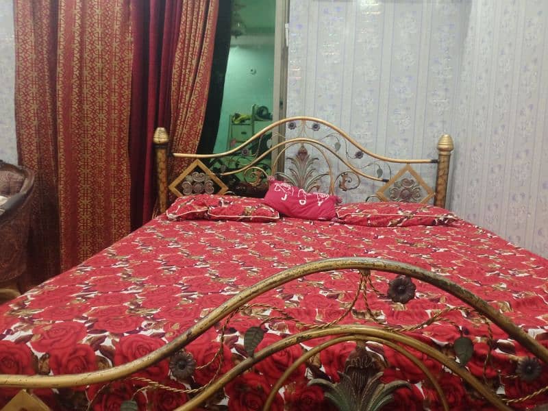 used condition iron bed urgent sale 0