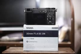 Sony a6300 with kit lens 16-50 or sigma 30 mm new