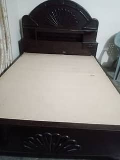 Double bed with metras and dressing table.