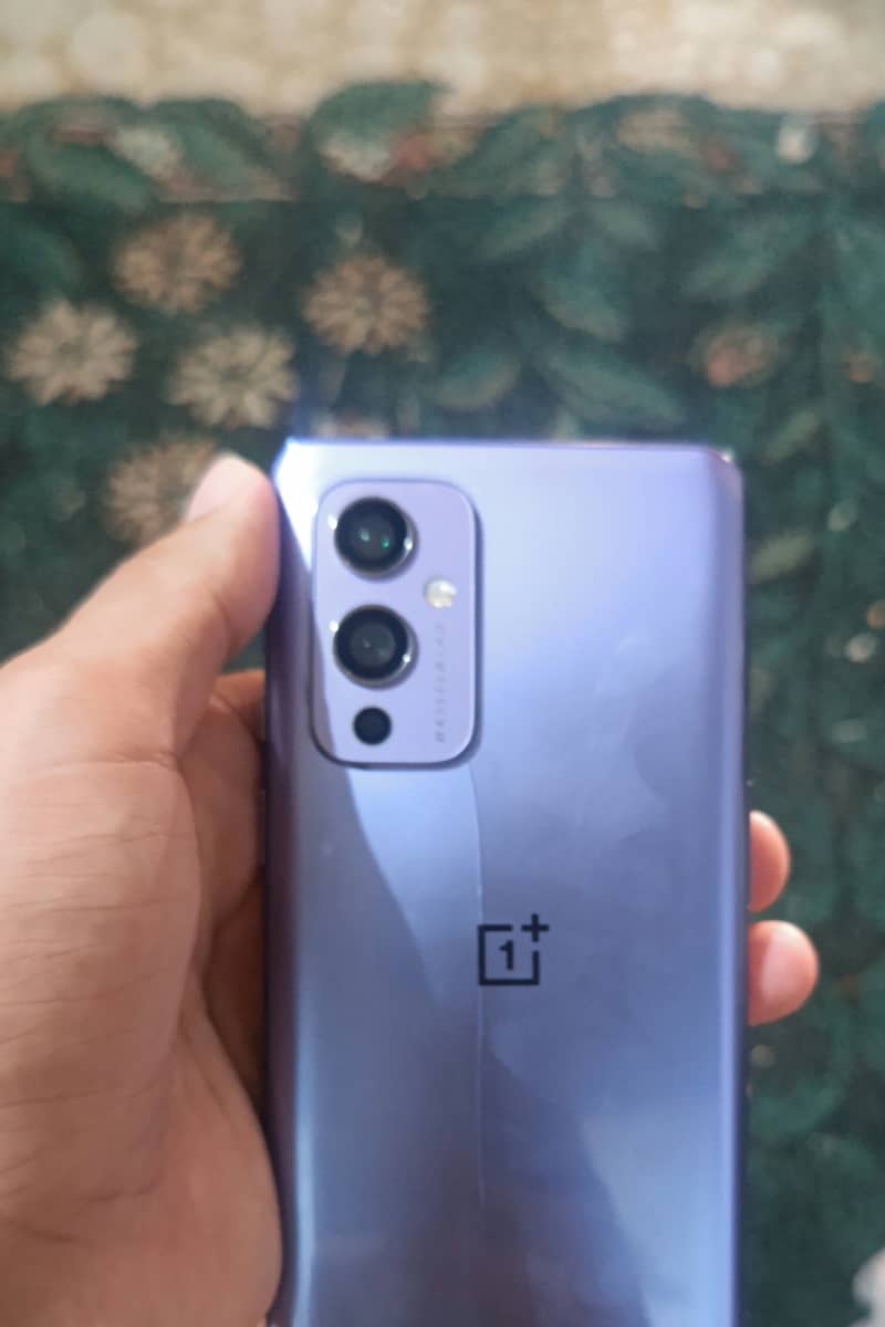 One plus 9 PTA approved Only back Broken 5