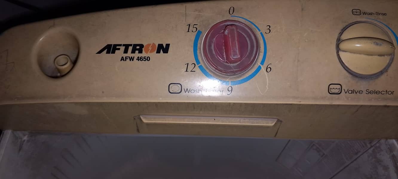 double washing and dryer machine only 13500 good condition baghbanpur 2