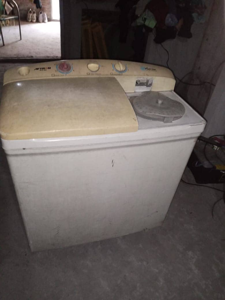 double washing and dryer machine only 13500 good condition baghbanpur 7