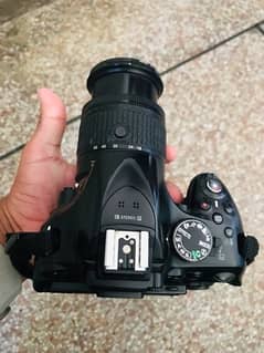 Nikon D5200 camera with 18-55 mm lense