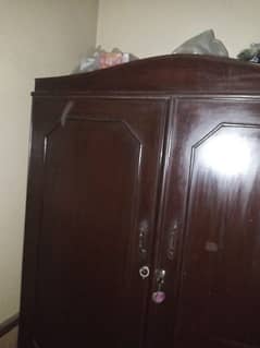 "Classic Mahogany Wardrobe with Ample Storage Space!"