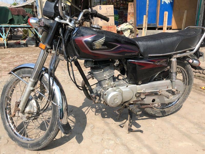 Honda 125 black color  engine 100 percent 6