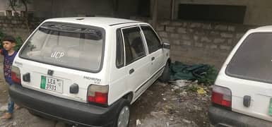 Suzuki Mehran VX 2012 non euro inside Geniun outside few touchups