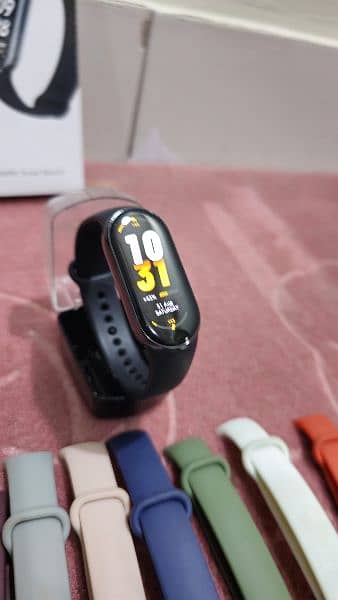 mi band 8 with 9 straps and a silicon cover scratch less condition 3