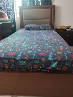 Two single beds with spring mattress