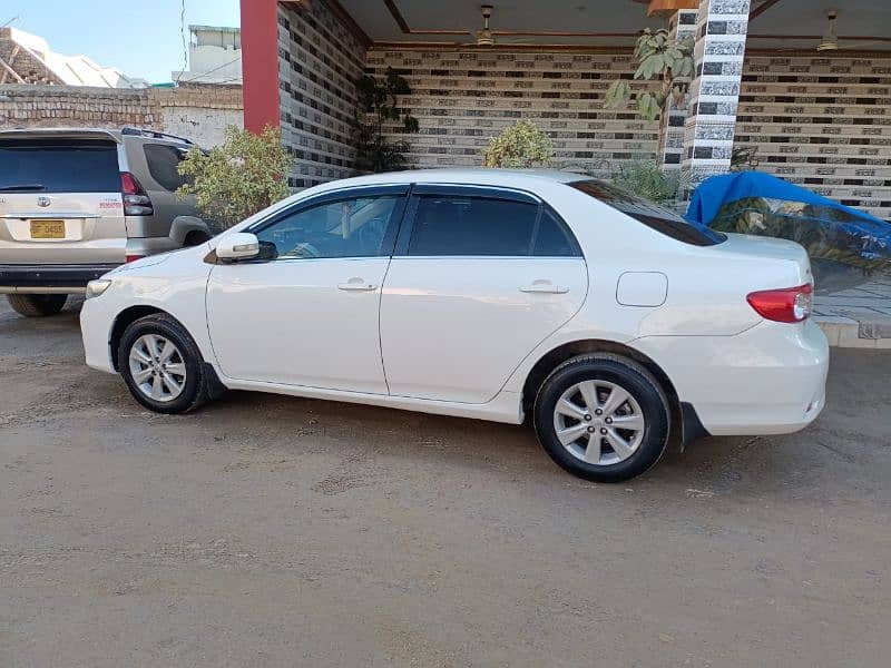 Toyota Corolla GLI 1.6 model 2013 Islamabad Registration white colour. 2