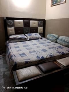 king size bed and 2 side table