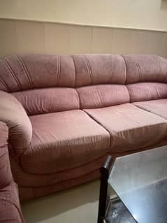 5 seater mehroon sofa with wooden table